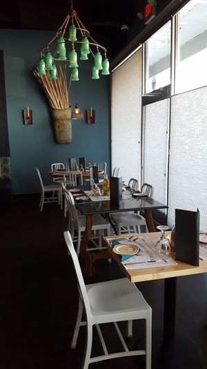 Tables by the window at Vrai in Lemoyne