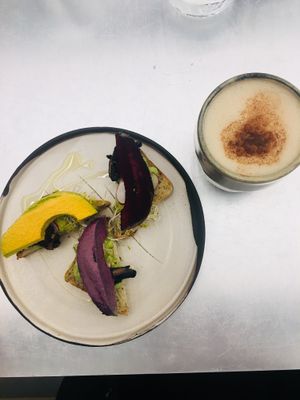 Avocado Toast and chai latte  at Essence Cuisine in East London