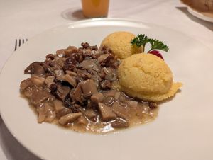Polenta with mushrooms at Ladin & El Tobià in Vigo Di Fassa