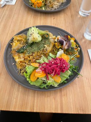 Daily special of 29.06.2021 (sweet potatoe spaghetti with almond milk and chickpea flour, pesto, mix of vegetable, salad) at MU-Food in Geneva