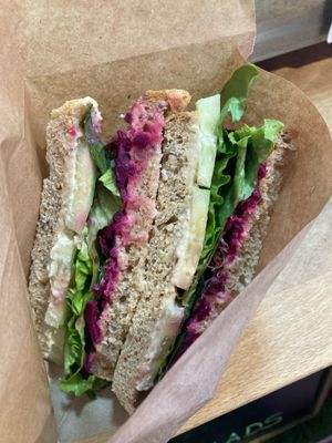 My delicious sandwich: umeboshi marinated beetroot, hummus, cucumber, sprouts, salad at Tapas del Huerto in Tenerife