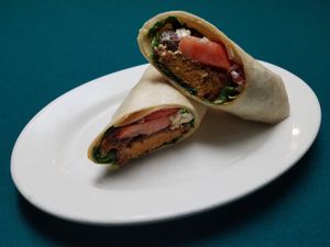 Buffalo Seitan Wrap with House Made Spicy & Crispy Seitan, House Made Vegan Buffalo Sauce, House Made Vegan "Blue Cheese" Sauce, L,T,O in a wrap!!! Now on the Specials menu. at Swift Half in North Haven