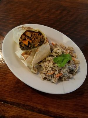 Vegan Jerk Jackfruit Wrap with Caribbean Black Beans, Cucumber, Carrot, Cilantro, & Blueberry Mango Chutney. Served with a side of Coconut Lime Quinoa at Swift Half in North Haven