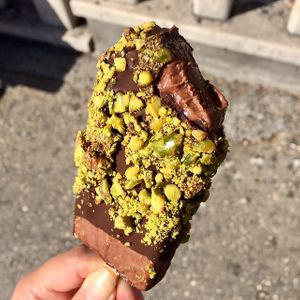 Banana-chocolate covered with the vegan dark chocolate and dipped in pistachios...so yummy 🤤I have to get at least one more before we‘re leaving Split   at Stixberry in Split