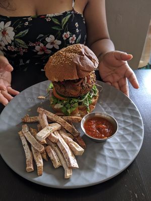 Burger with fries and ketchup at El Grifo in Caguas