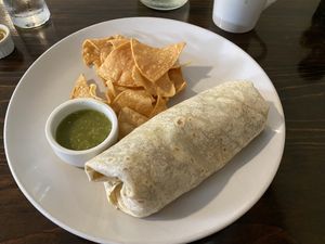 Brunch burrito with chorizo, egg, and crema removed - $16.50  at The Hoot in Northport
