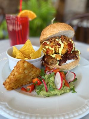 
NEW! Hangover Sausage-and-egg burger
Seitan sausages. scramble vegan eggs, garlic mayo, melted cheddar cheeze,
salsa and crispy onions.. *Served with guac, hash brown and torti at Miranda Cafe in North London