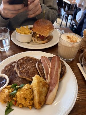 American breakfast (front), Hangover Sausage and Egg Burger (back)  at Miranda Cafe in North London