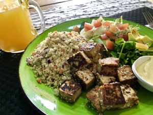 Tofu with Couscous and a watercress salad with special dressing.  at Sweet and Blue in Willemstad