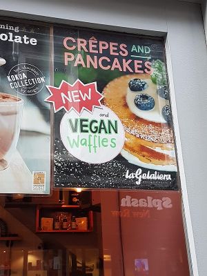 ad for vegan wafffles on front window at La Gelatiera in London