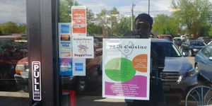 Credit cards, happy cow sticker at Crash Cuisine in Loveland