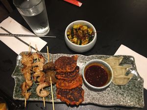 oops we ate some before I grabbed the camera. This was a selection from the starters menu: shrimp, beef and chicken kebabs, dumplings, Ming bean patties, marinated cucumber (delicious!) at Jade Rabbit in Portland