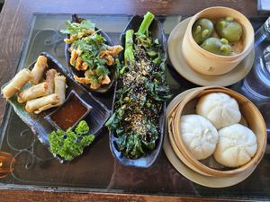 Lumpia, chilli wontons, gailan, jade dumplings, char siu bao   at Jade Rabbit in Portland