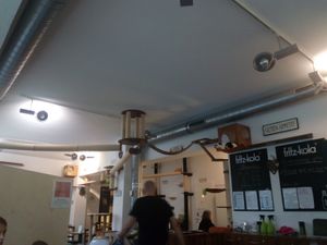 The place with one of the cats in her bed under the roof at Katzentempel - Nürnberg in Nuremberg