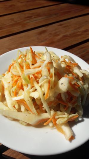 Cabbage salad was included in the meal, so was water at Hasta la Pasta in Naantali