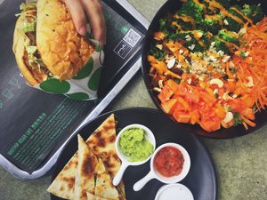 Bajaja burger, carnita quesadilla, sunrise in Phuket salad at Root Pop in Beijing