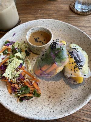 Spring rolls!!  Loved the almond dipping sauce and the rolls had mango and avocado.  So good!  at Drifter Surf Shop & Cafe in Pecatu