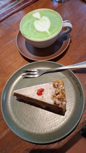 Vegan carrot cake & hot matcha latte with oat milk at Drifter Surf Shop & Cafe in Pecatu