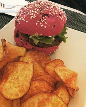 Great mushroom/beans burger with its pink bread at Veggie Cafe in Albufeira