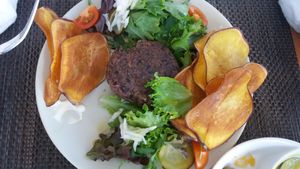 Mushroom burger w/ sweet fried potatoes...  at Veggie Cafe in Albufeira