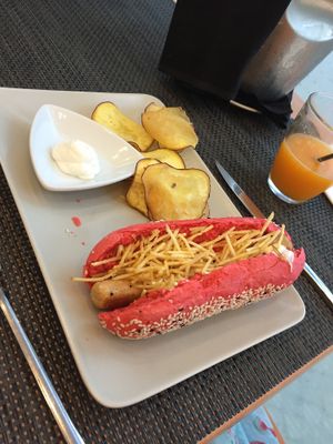 Vegetarian hotdog with pink ketchup roll at Veggie Cafe in Albufeira