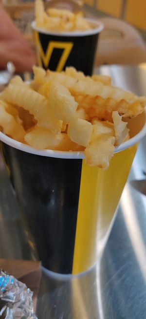 The fries arrived in a large pot which I was expecting in a small paper bag. They were very nice but I could only have tomato ketchup as she wasn't sure on the other dips! at Which Wich in Port St Lucie