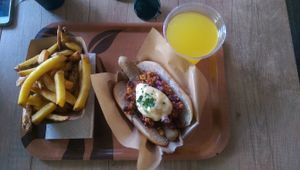 Chilli not dog, fries and brain booster drink at Voodies in Vienna