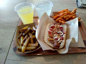 drinks, fries and vienna dog at Voodies in Vienna