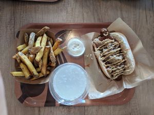 Dog, Dutch fries, garlic dip, lemon water at Voodies in Vienna