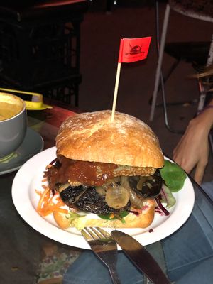 Burger with tempeh mushroom and pineapple  at Scallywags Cafe in Magnetic Island
