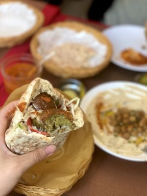 Pickles & Hot sauce is a must!!  at Falafel TLV in Hong Kong Island