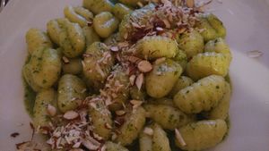Gnocchi with pesto and almond chips. at Trattoria Di Mirko in Alghero
