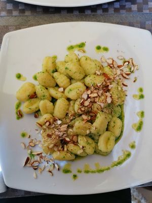 Vegan gnocchi with Rucola pesto and almonds at Trattoria Di Mirko in Alghero