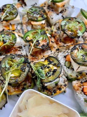 Sweet Potato Tempura, Shiitake Mushrooms & Asparagus
Topped w/ avocado, tofu, seared jalapeños, ankake sauce, cilantro vinaigrette, black sesame & micro greens.  Our favorite!  at Sushi 2 in San Diego