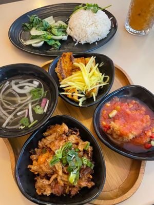Combo 1 featured: Sweet & Sour Crispy Tofu, BBQ Vegan Meat, Caramel Tofu-Seitan, White Rice, Bok Choy, and Soup at Saigon Lotus in Toronto
