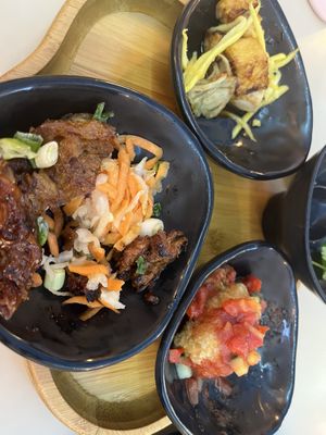 Combo Platter 1:  Sweet and Sour Crispy Tofu;  Bbq Vegan Meat;  Caramel Tofu-Seitan;  Also, came with rice (choice of white or brown) with a side of kimchi, and soup broth.  Yum!  at Saigon Lotus in Toronto