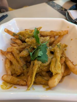 Butter chicken poutine at Saigon Lotus in Toronto