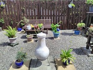 Cosy garden, a safe place for any dog guests, as well as the ideal place to relax at the end of the day with a cold glass of wine or beer.  at The Cosy Vegan in Dunfermline