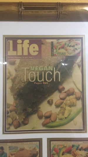 featured in the local paper at Sweet Vegan Cafe in Kingston