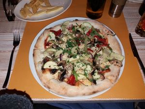 Vegan pizza with tofu and a mix of veg (no cheese) at Alouette in Bucharest