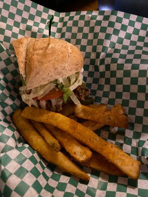 Mock-Chicken Delight -
Mock-chicken, sauteed mushrooms, peppers & onions, melted vegan cheese, with fresh lettuce, tomato, and Vegenaise on a whole wheat hoagie  at Loggers Tap House in Roseburg