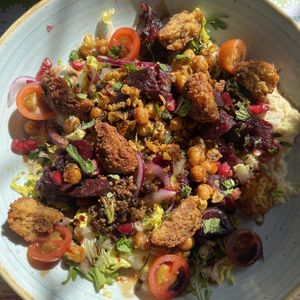 Vinegar dressing was very strong & unspecified in description. More salad vegetables would be nice to balance out the fried aspects of the dish. Hummus was lovely.   at Zapato Lounge in Northampton