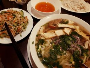 strong vegetable broth with rice noodles at Amitabha in Prague