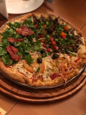 Mix de cogumelos, “vrango” com catupop e rúcula, tomate seco e chèvre   at Pop Vegan Food in Sao Paulo