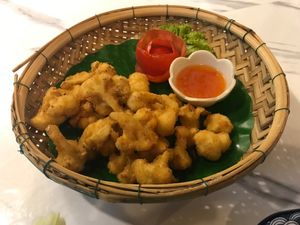 a crispy fried and breaded cauliflower plate, yum at Dow Vegan Restaurant in Koh Phi Phi