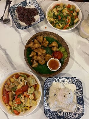 Sweet & Sour with fake chicken and boiled rice. Deep fried cauliflower. Tofu curry and brown rice    at Dow Vegan Restaurant in Koh Phi Phi