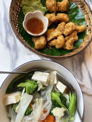 Noodles with tofu in gravy sauce (soup) and cauliflower wings  at Dow Vegan Restaurant in Koh Phi Phi