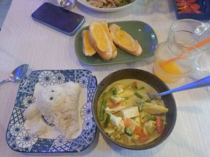 Green curry with rice and garlic bread at Dow Vegan Restaurant in Koh Phi Phi