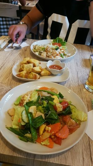 Sweet and sour and pad thai with chicken  at Dow Vegan Restaurant in Koh Phi Phi