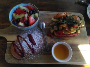 Veganized breakfast platter with cold (!) veggie bread, buckwheat pancakes and yogurt at Rosmarie in Aalen